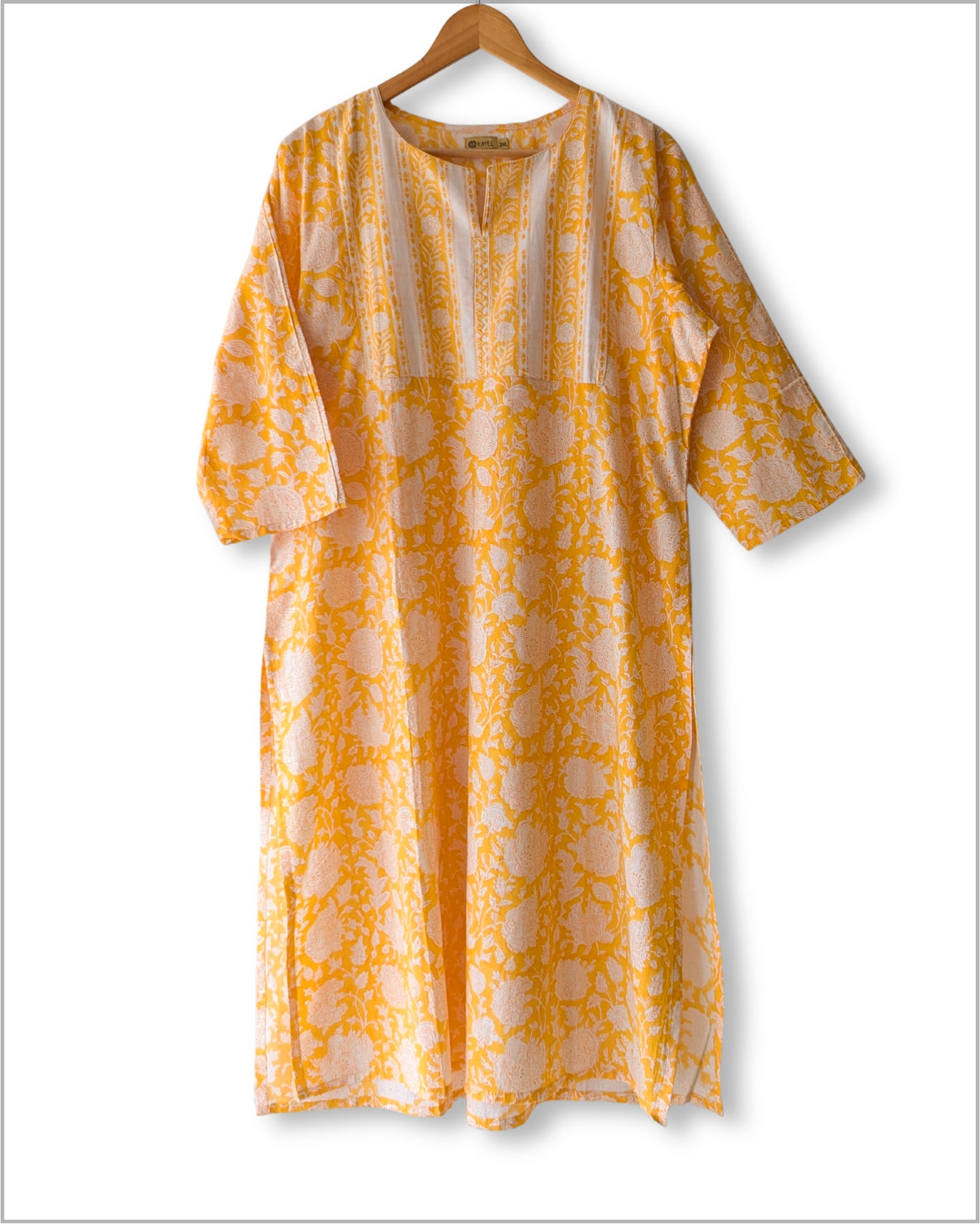 Block printed kurta with vertical stripes yoke + hand embroidery.