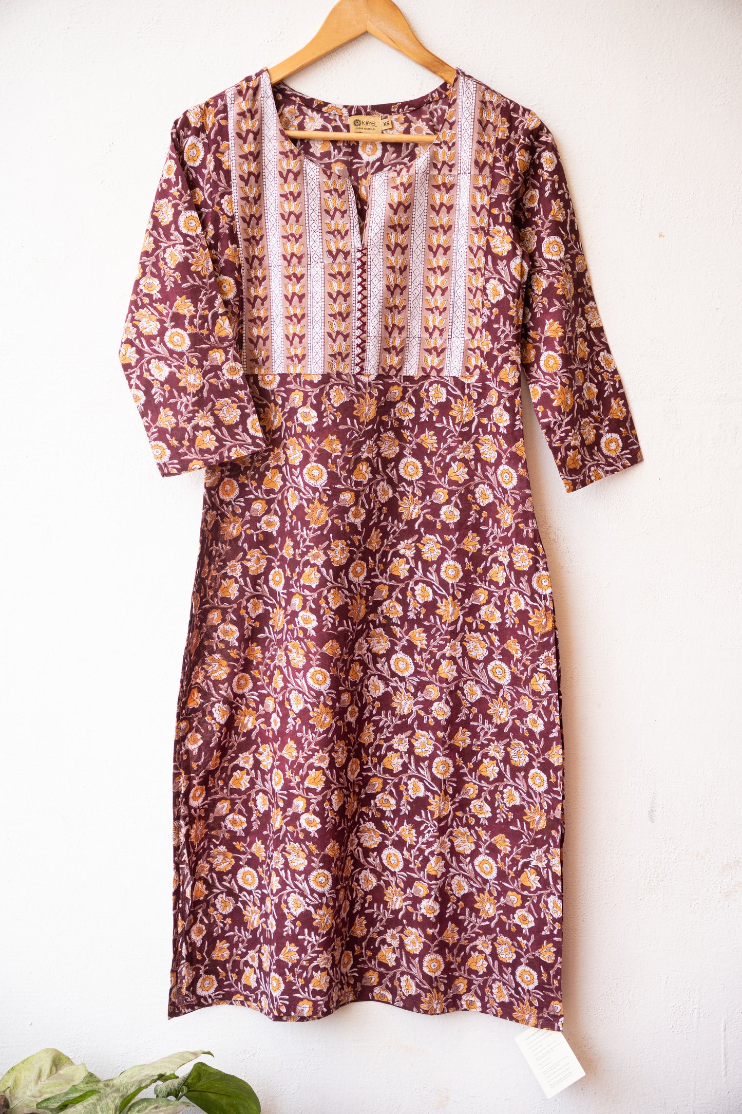 Block printed kurta with vertical stripes yoke + hand embroidery.