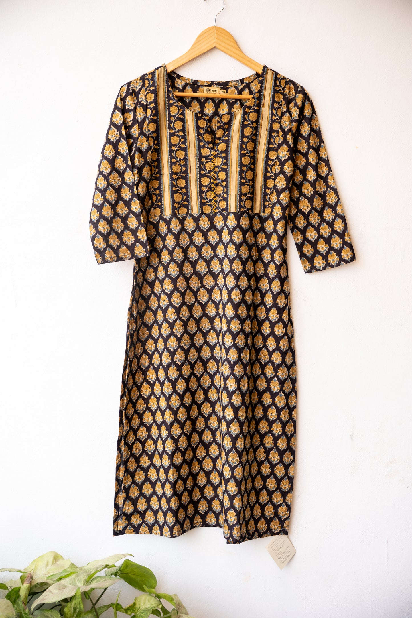 Block printed kurta with vertical stripes yoke + hand embroidery.