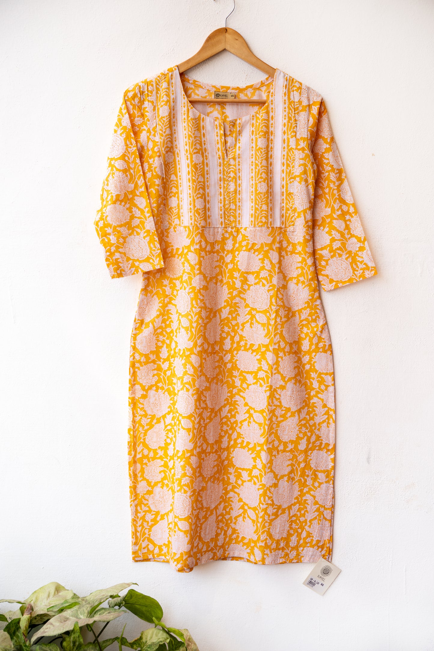 Block printed kurta with vertical stripes yoke + hand embroidery.