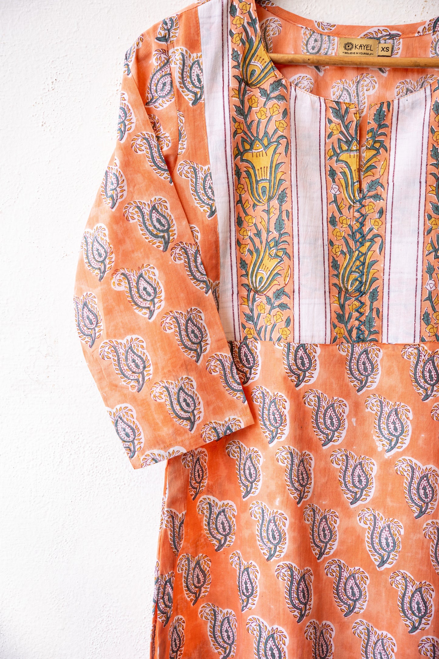 Block printed kurta with vertical stripes yoke + hand embroidery.