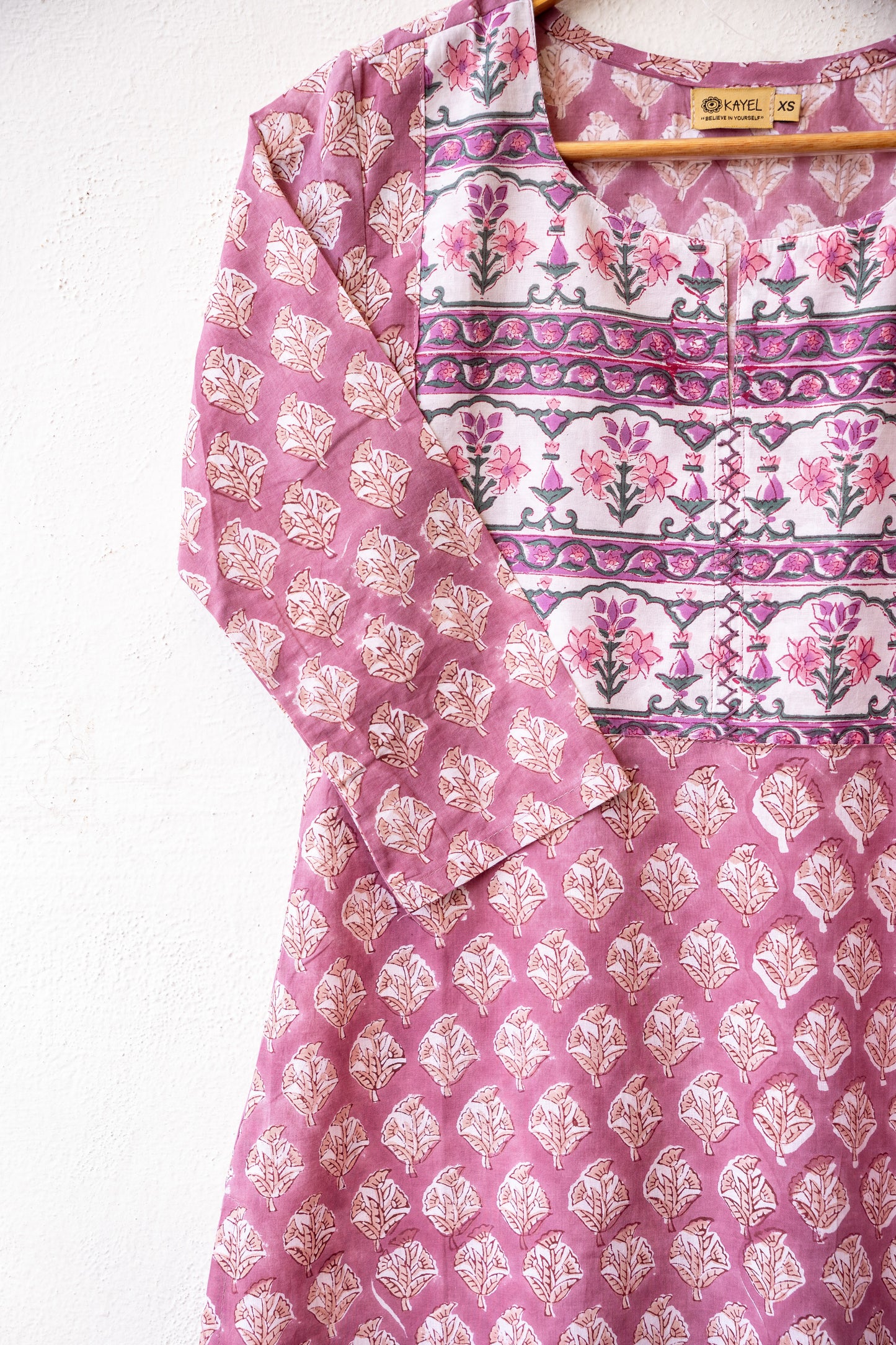 Block printed kurta with vertical stripes yoke + hand embroidery.
