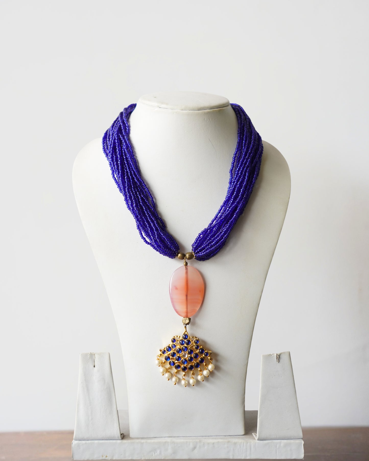 Handcrafted Multi-Strand Necklace with Traditional Kemp Pendant