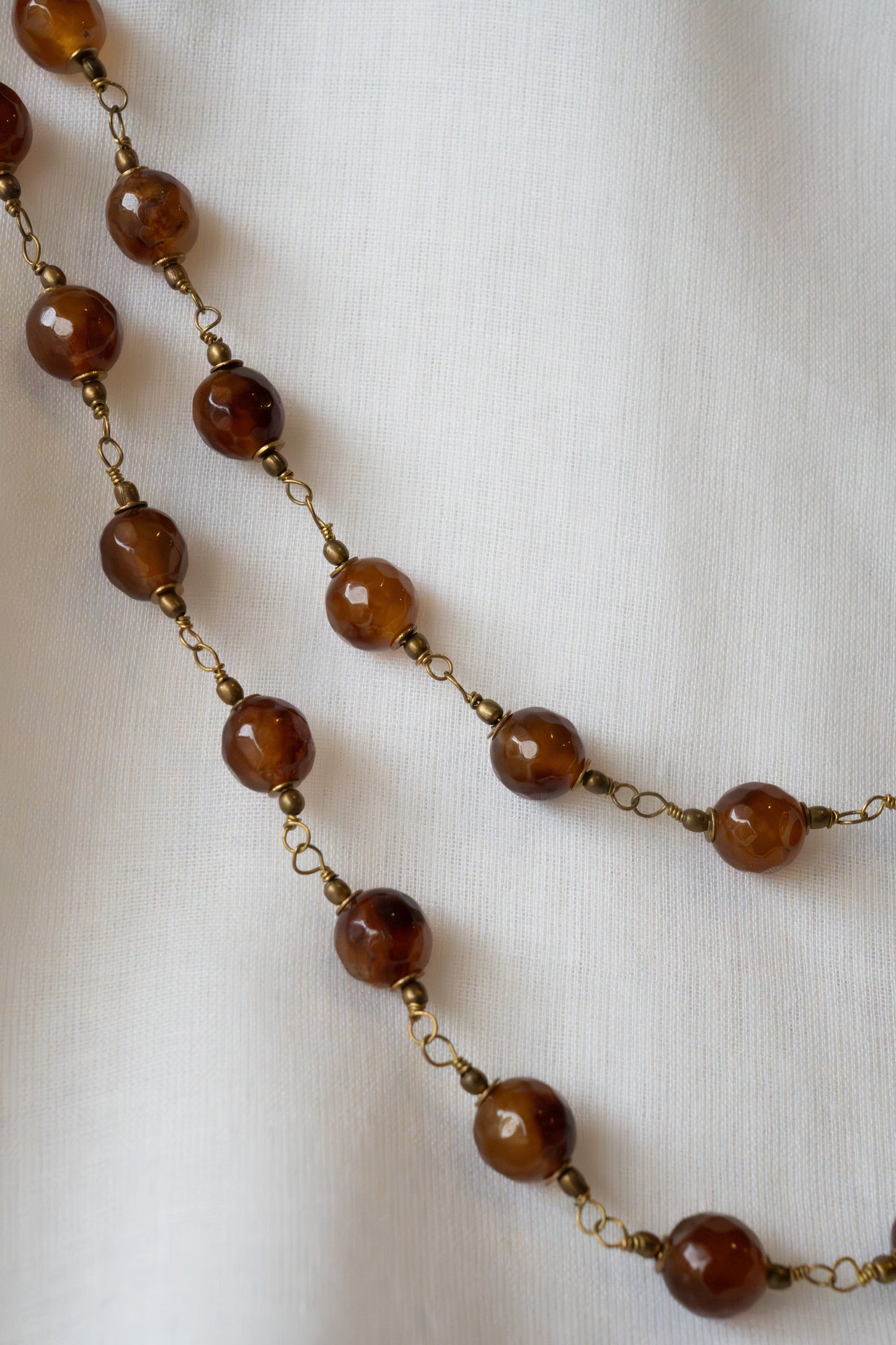 Handmade, hand-twisted agate stone long necklace.